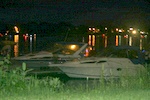 Boats parked along the shore